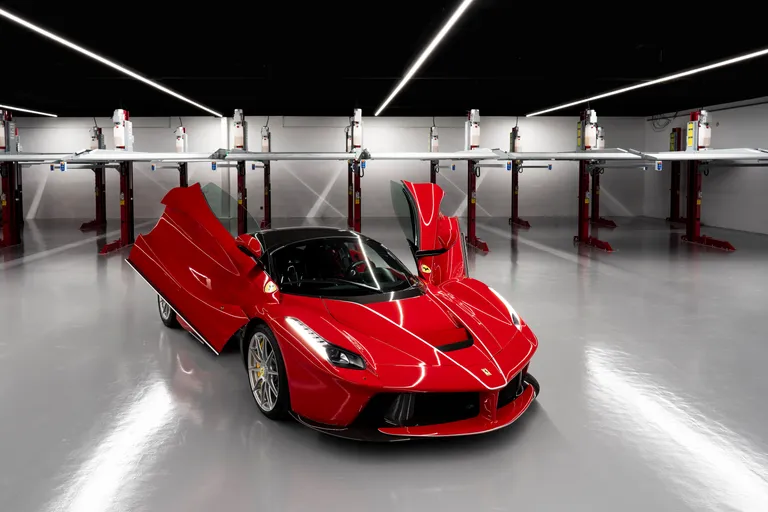 Strongman Lifts - Donnington auto stacking lifts installation in a sports car storage facility in Dubai