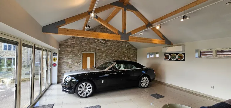 Car inside house