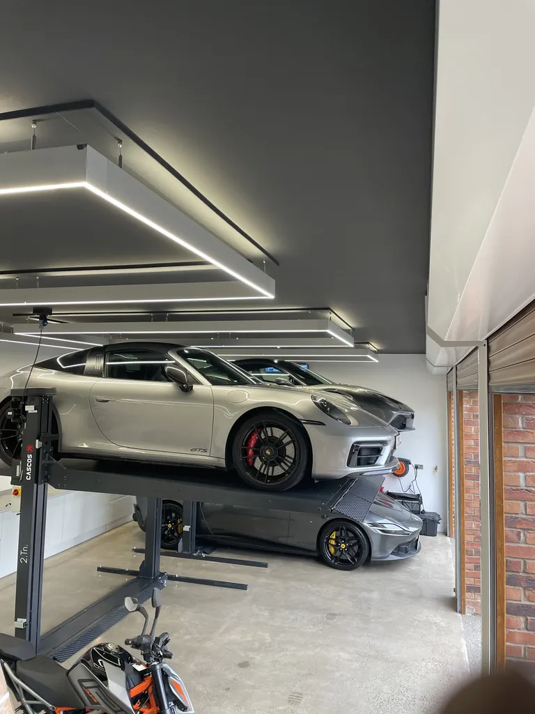 Strongman Lifts - Tongland low profile car storage lift in luxury dream garage