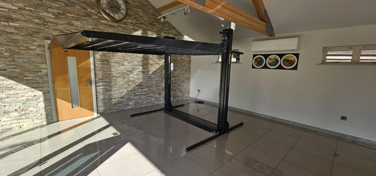 Strongman Lifts - Tongland featured in a luxury dream garage