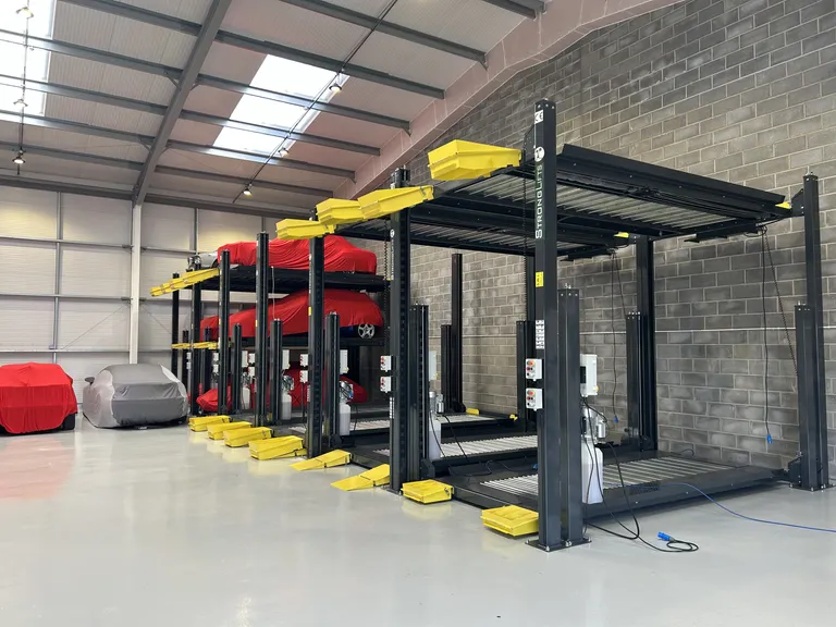 Strongman Lifts - Bewdley four post parking system installed in a car storage facility