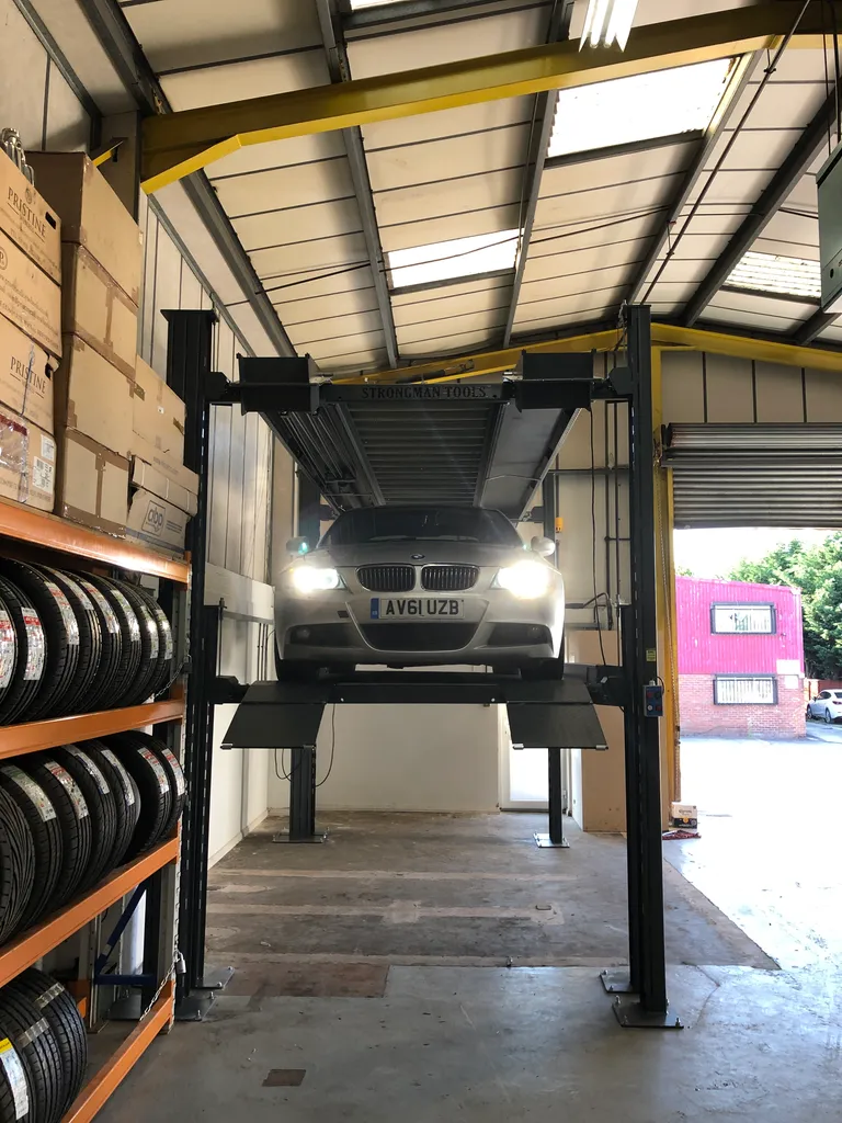 Strongman Lifts - Bewdley featuring 2 raised car parking platforms