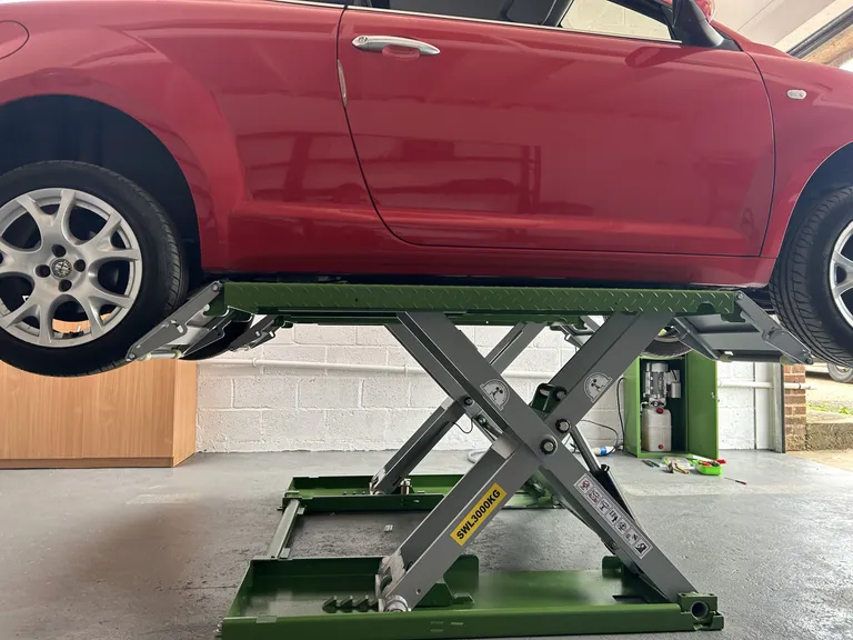 Strongman Lifts - Clifton car scissor lift midrise