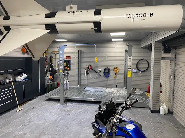 Strongman Lifts - Dean car parking lift in customer's fun garage