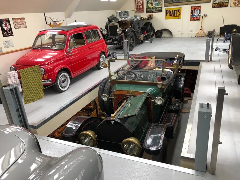 Strongman Lifts - Bannockburn multilevel four post car lift used in a customer's garage