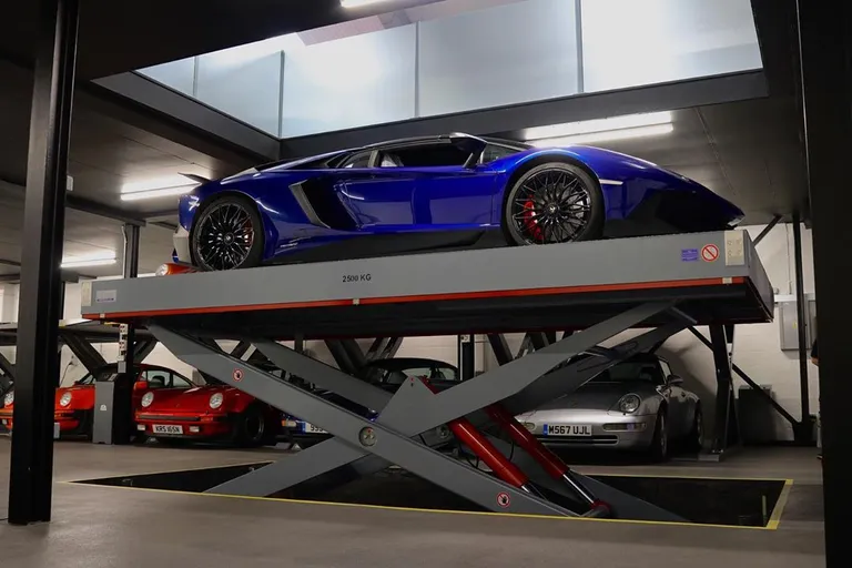 Strongman Lifts - Conwy scissor mezzanine lift installed in a car storage facility