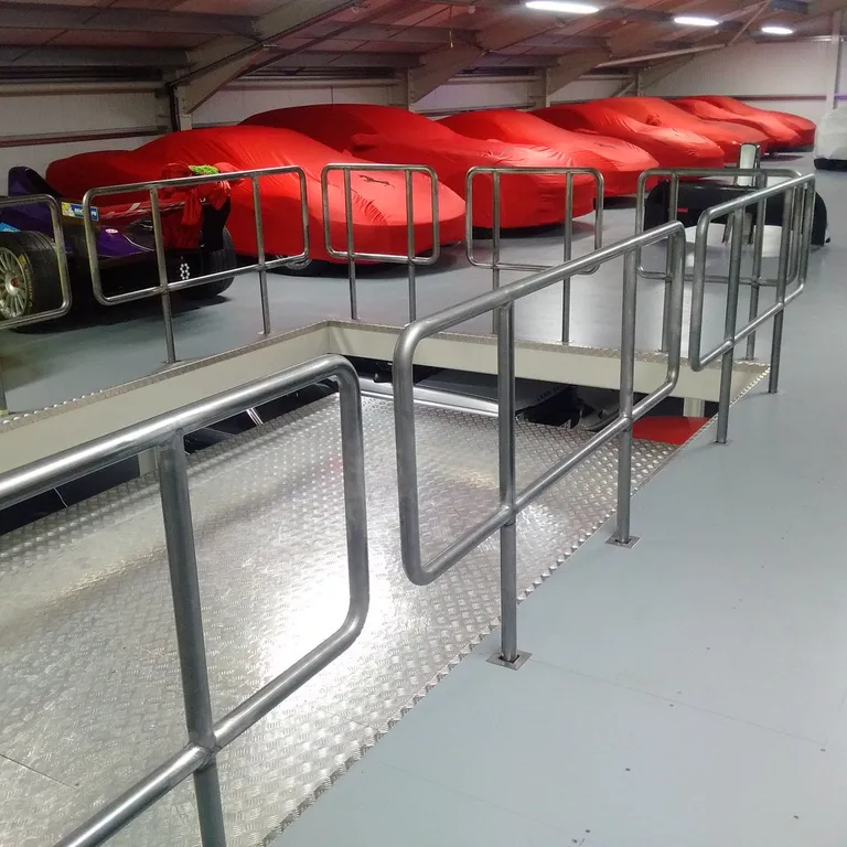Strongman Lifts - Multi-level mezzanine car lifting and elevating