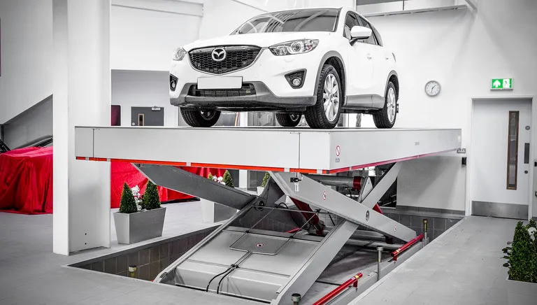 Strongman Lifts - Heavy duty high height auto scissor lifts