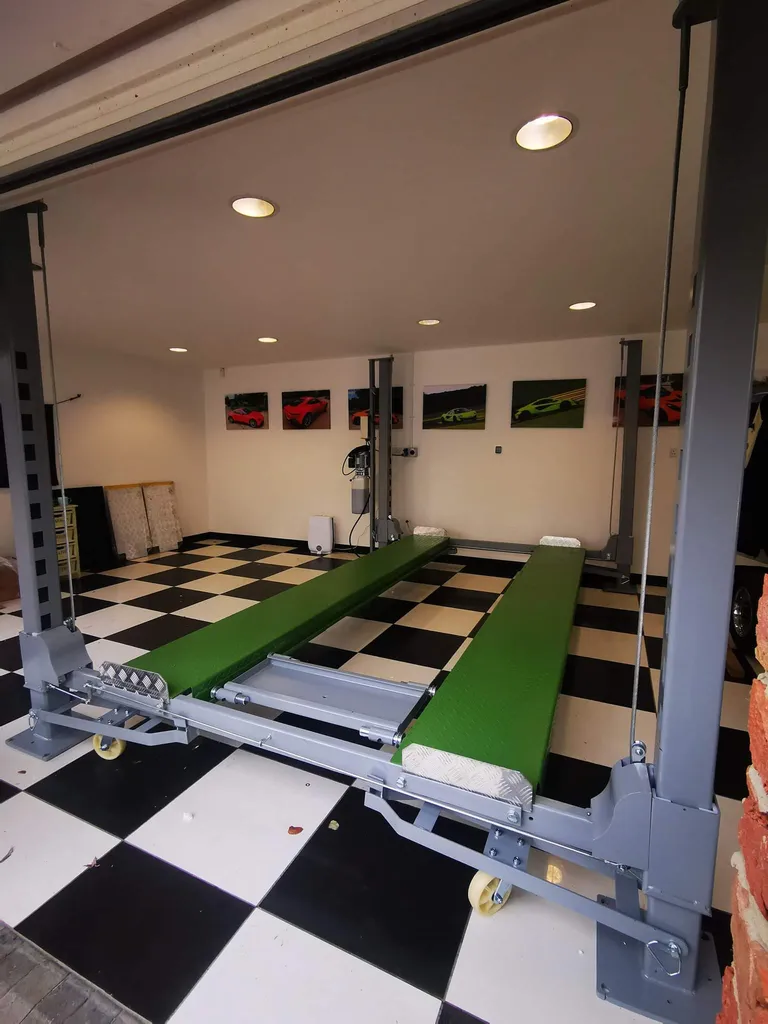 Strongman Lifts - Alness car maintenance and parking lift installed in a client's garage