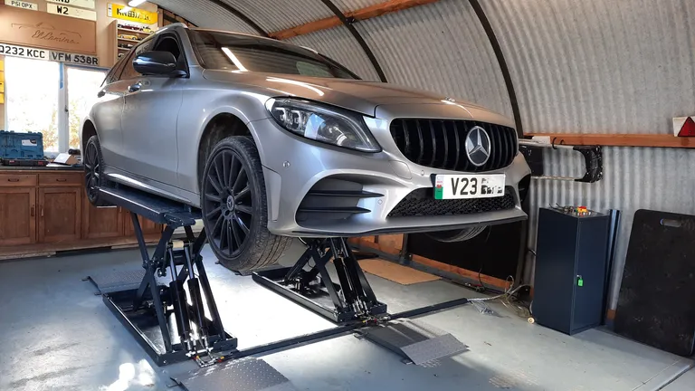 Strongman Lifts - Helmsdale scissor midrise car lift in customer's garage